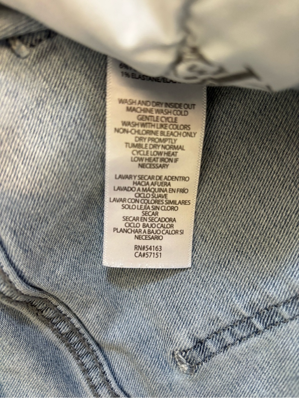 Calvin Klein Jeans Light Blue High-Rise Denim with Tan Patch and Black Tab - Picture 8 of 8